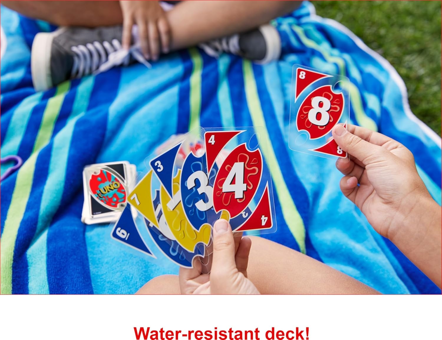 image:imageMattel Games UNO Splash Card Game Ages 7 210 Players With Waterproof Cards ampPortable Carabiner Clip for Travel Pool Time Camping amp Game Nights AwayUno Splash