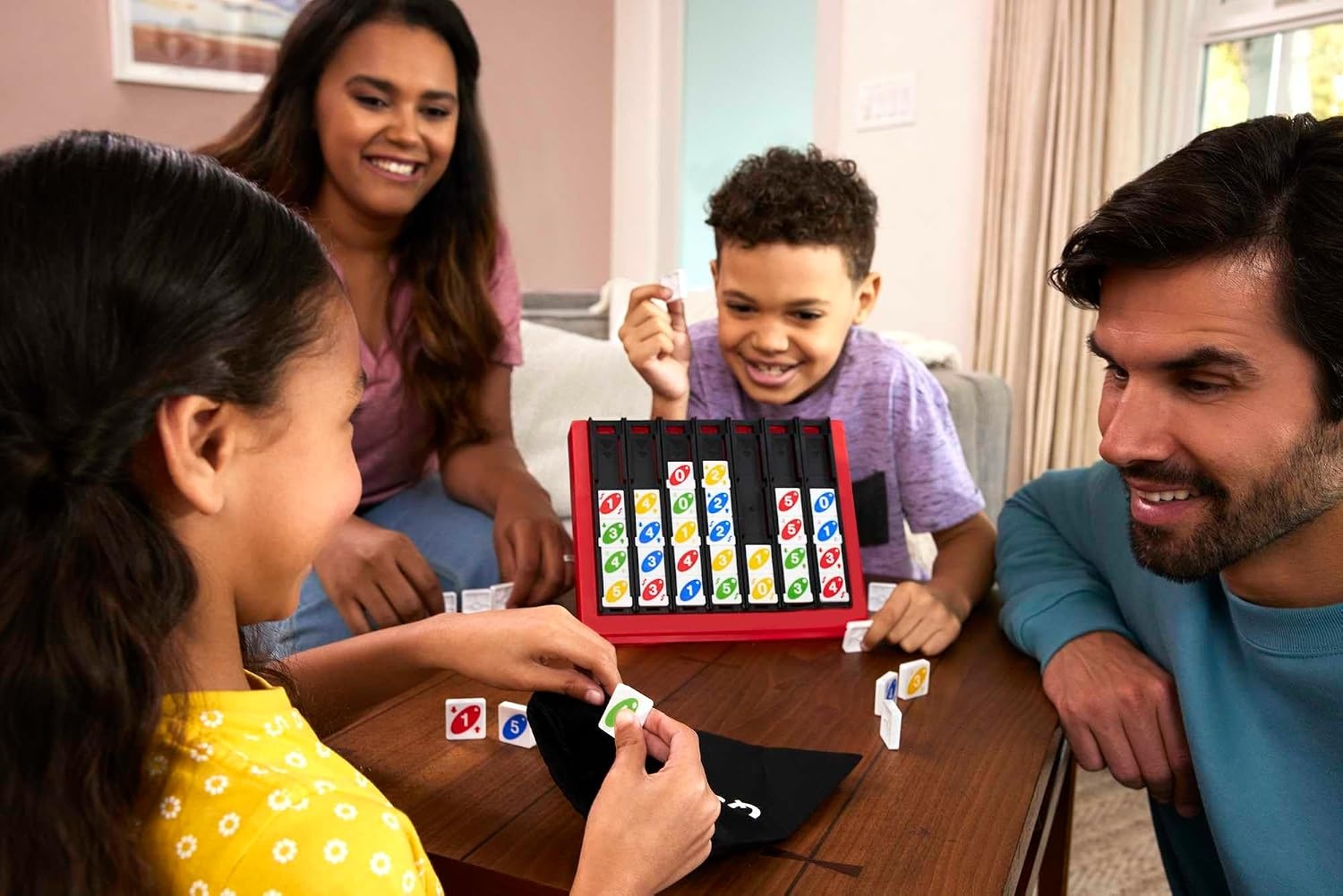 image:imageMattel Games UNO Quatro Game with Colored Tiles amp Plastic Grid for Adult Family amp Parties 2 to 4 Players Ages 7 Years Old amp Up