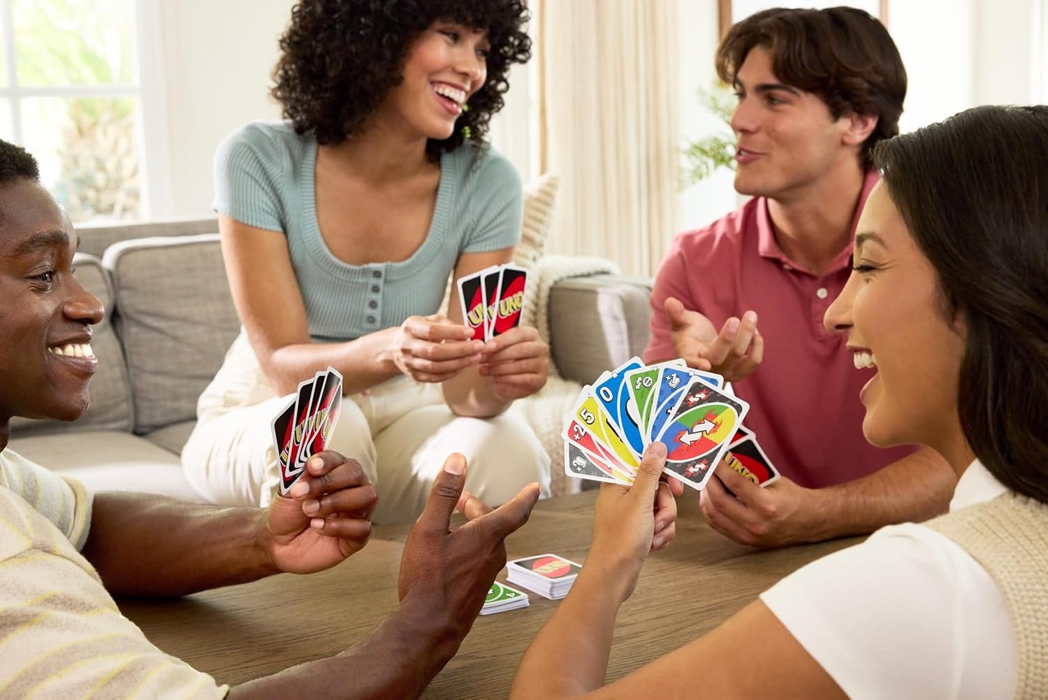 image:imageMattel Games UNO Card Game with 2 Add On Packs with Storage Tin Includes UNO Deck and 2 AddOn Packs for Kids Teens amp Family Game Night for Ages 7 210 Players Amazon ExclusiveUNO wAddOn Reverse Stack Packs